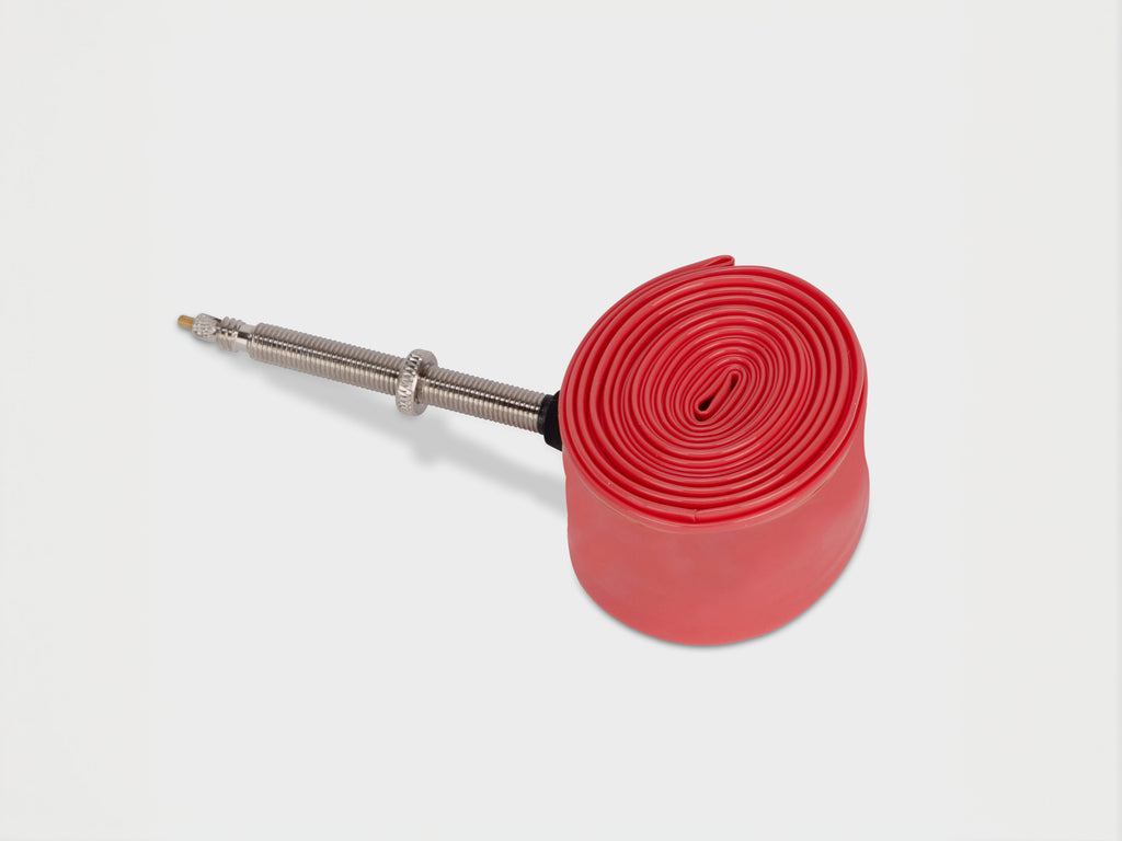 Litebike TPU inner tubes, displaying the compact, lightweight tube, meticulously engineered with nanotechnology for strength, speed, and portability, ideal for road cycling and bikepacking.