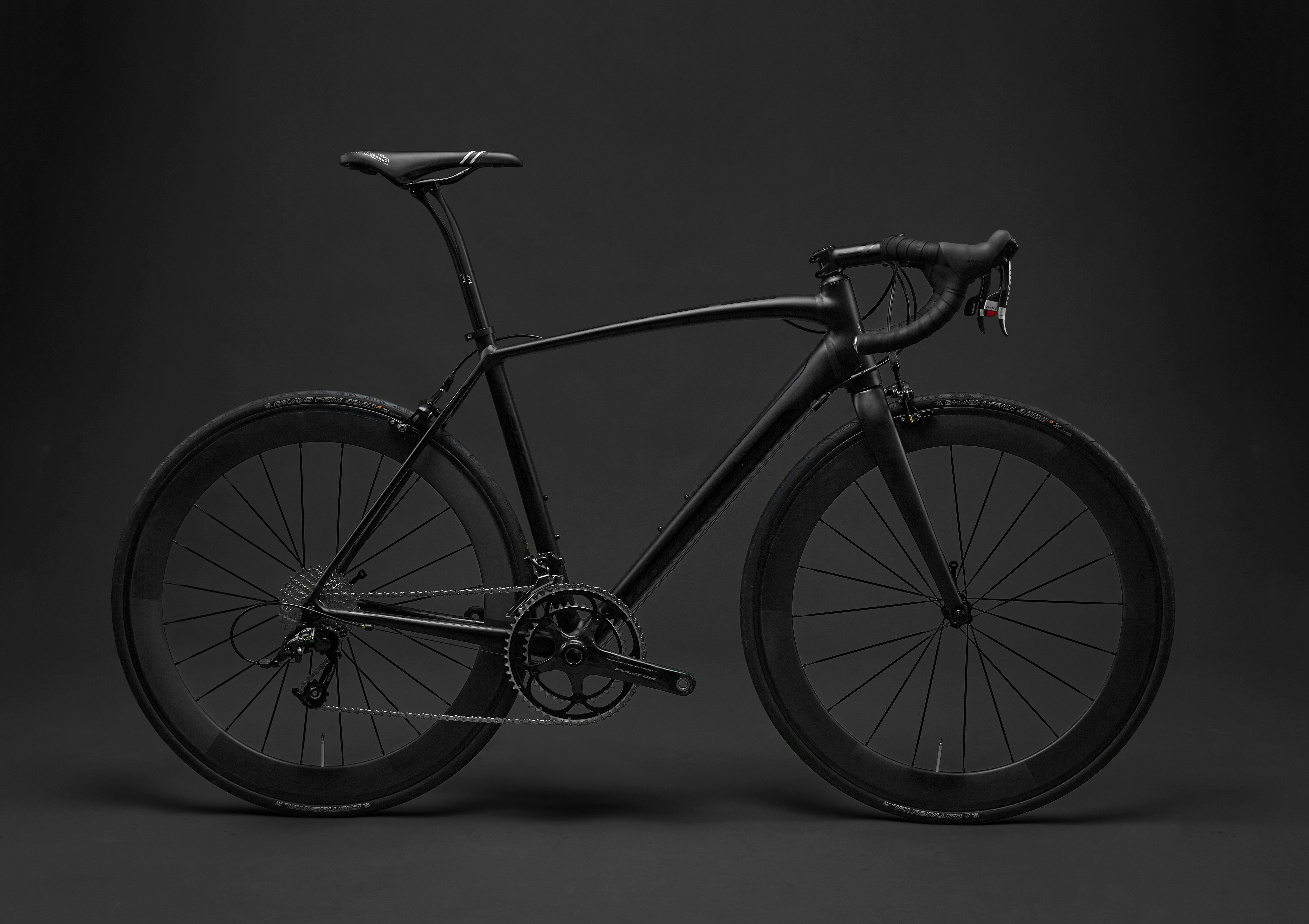 Litebike lightweight carbon bike in black showcasing lightweight carbon seatpost, stem and lightweight carbon handlebars